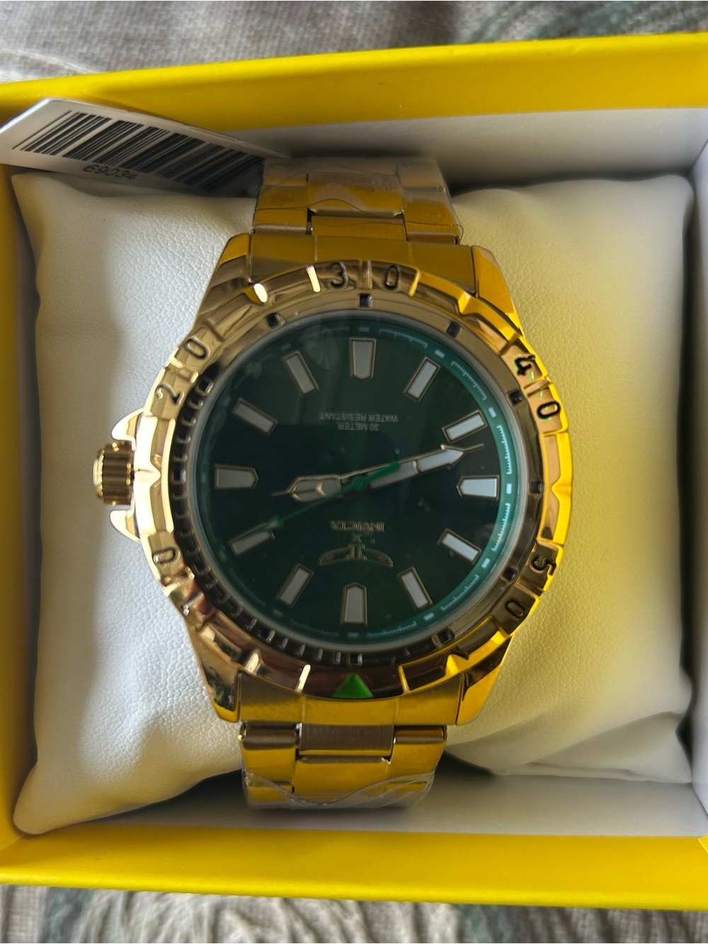 Invicta Gold Tone Watch with Green Dial